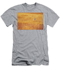 A Coyote Hunting Insects in a Golden Keith Ladzinski T-Shirt