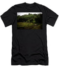 A Gray Donkey Stands Near the River Chico Sanchez T-Shirt