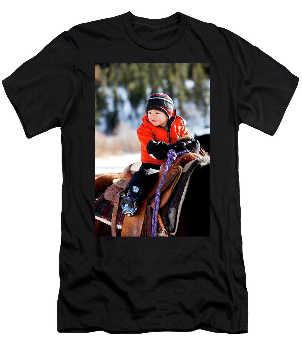 A Little Boy Rides a Horse While Steve Glass T-Shirt