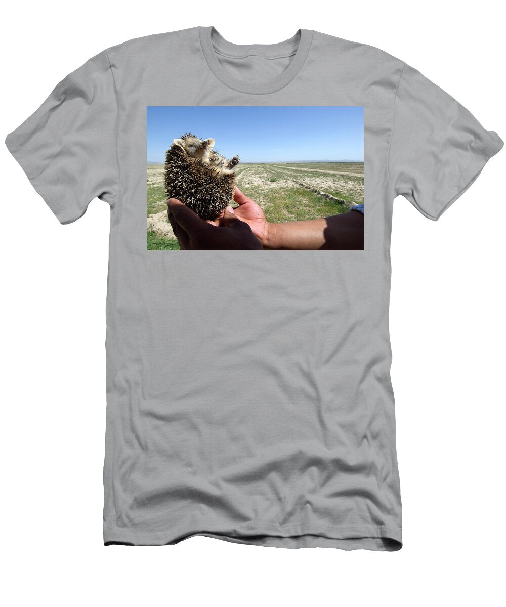 A Man Holds a Long Eared Hedgehog Beth Wald T-Shirt