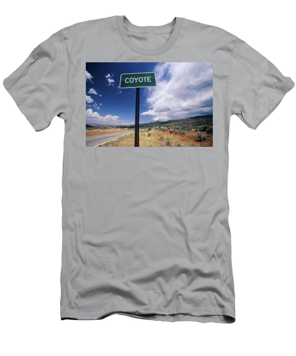 A Road Sign Reads Coyote Panoramic Images T-Shirt
