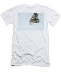A Solitary Coyote in Snowy Landscape Anita Wooldridge T-Shirt
