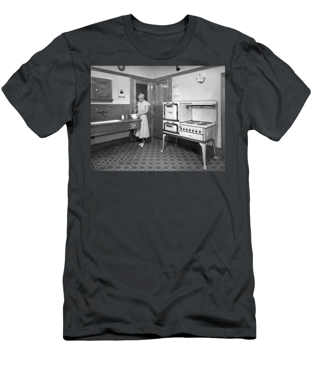 A Woman Cooking in Her Kitchen Underwood Archives T-Shirt