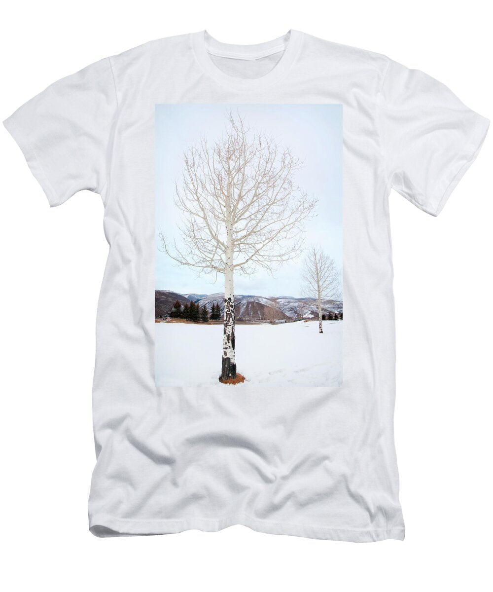 Bare Aspen Tree in a Snowy Field Leslie Parrott T-Shirt
