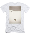 Coyote in the Middle of a Snowy Field Tim Martin T-Shirt