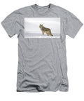 Coyote Looking Back in a Snowy Landscape Anita Wooldridge T-Shirt