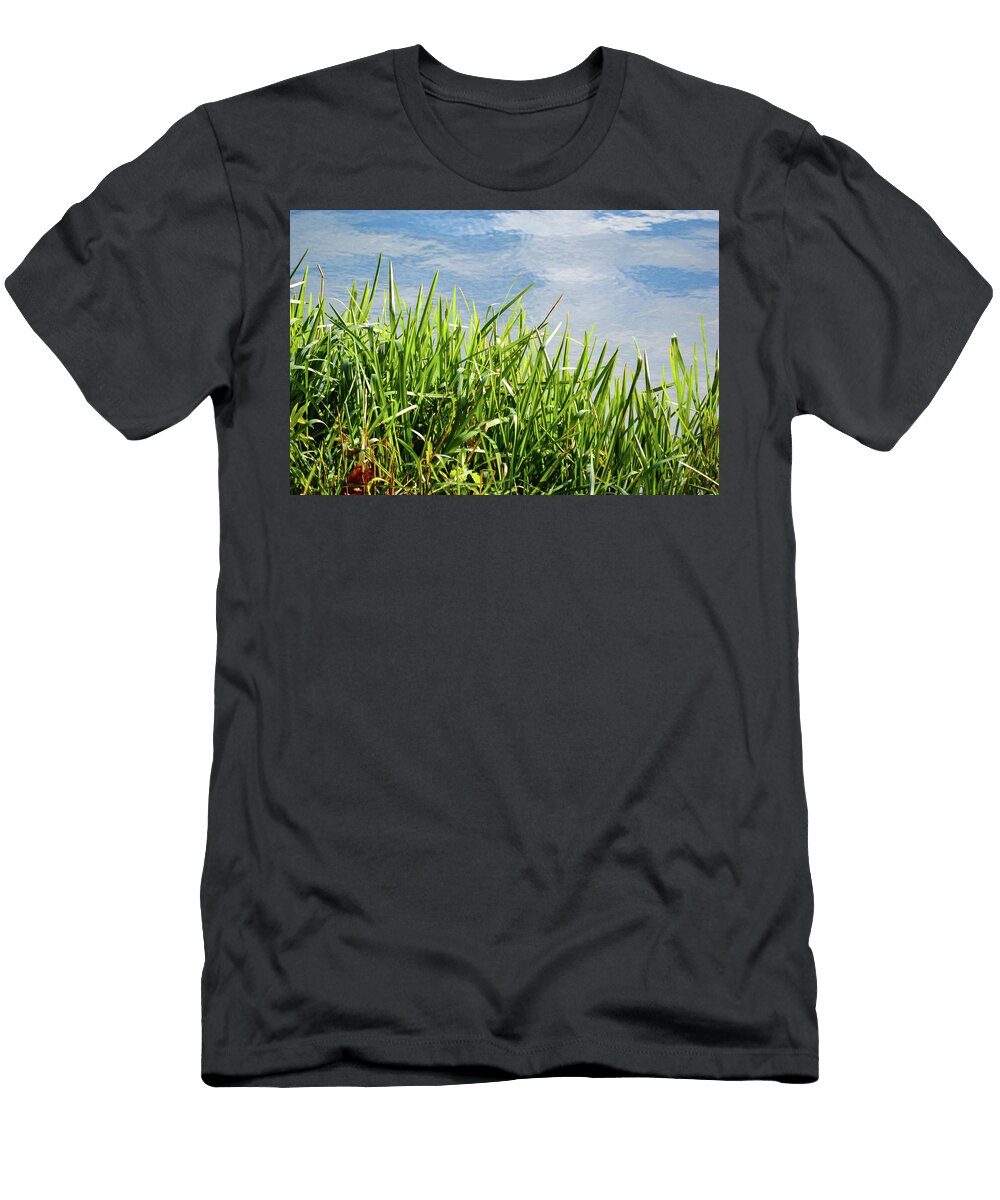 Fresh Green Grass with a Sky and Cloud Reflection Johan Ferret T-Shirt
