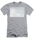 Large Bird in Flight Under Gray Sky Johan Ferret T-Shirt