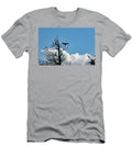Silhouette of a Bird Landing on a Tree Johan Ferret T-Shirt