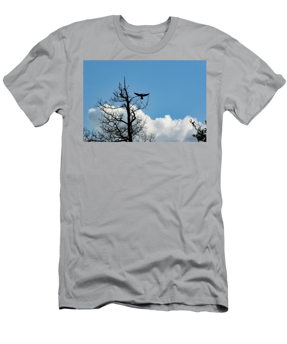 Silhouette of a Bird Landing on a Tree Johan Ferret T-Shirt