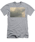 Three Birds Flying Against Stormy Grey Clouds Johan Ferret T-Shirt