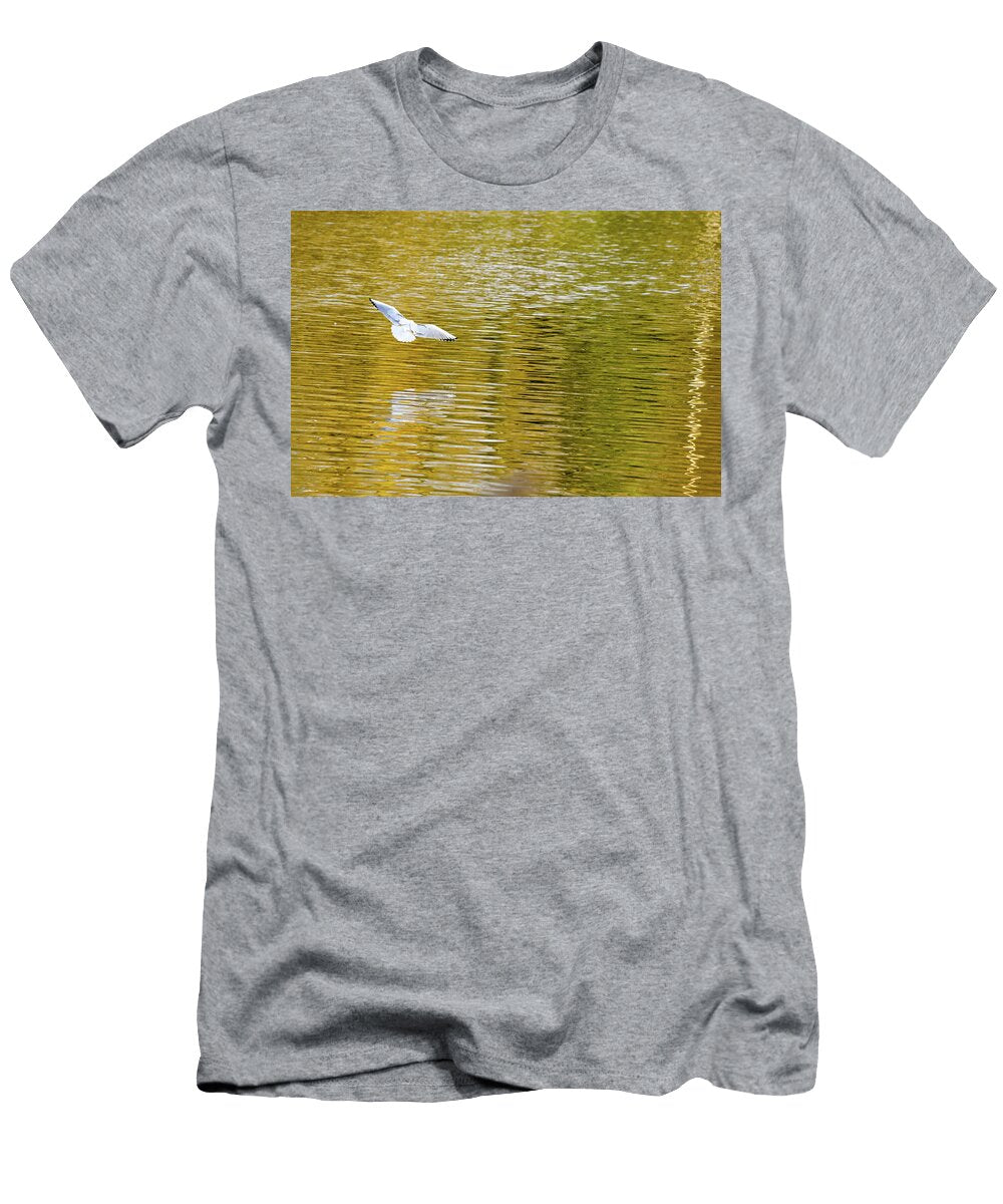 White Bird Flying Over Autumn Colored Lake Johan Ferret T-Shirt